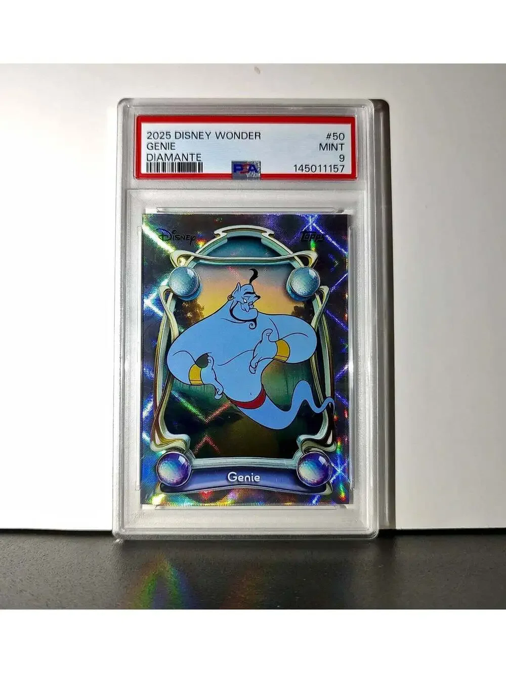 Genie 2025 Topps Disney Wonder #50 Winter Variant Card Aladdin PSA 9